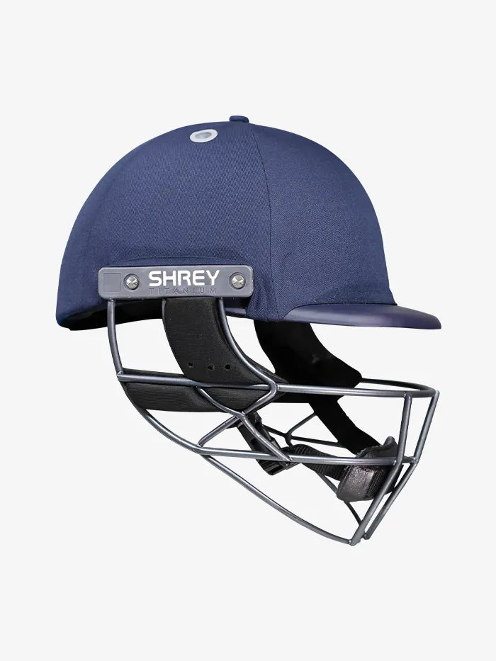 Navy Shrey Cricket Helmet Elite Pro Titanium by Cric Studio Canada with protective faceguard and ventilation holes for safety.
