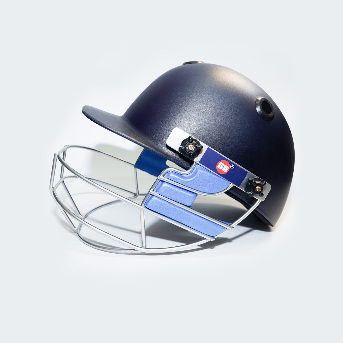 SS Elite cricket helmet with face guard, blue color and ventilation vents, designed for safety and comfort during cricket matches.