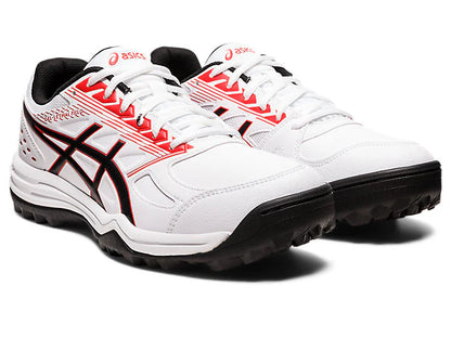 Asics Gel Lethal Field cricket shoes with cushioned soles, white and blue design, and athletic grip for outdoor cricket play.