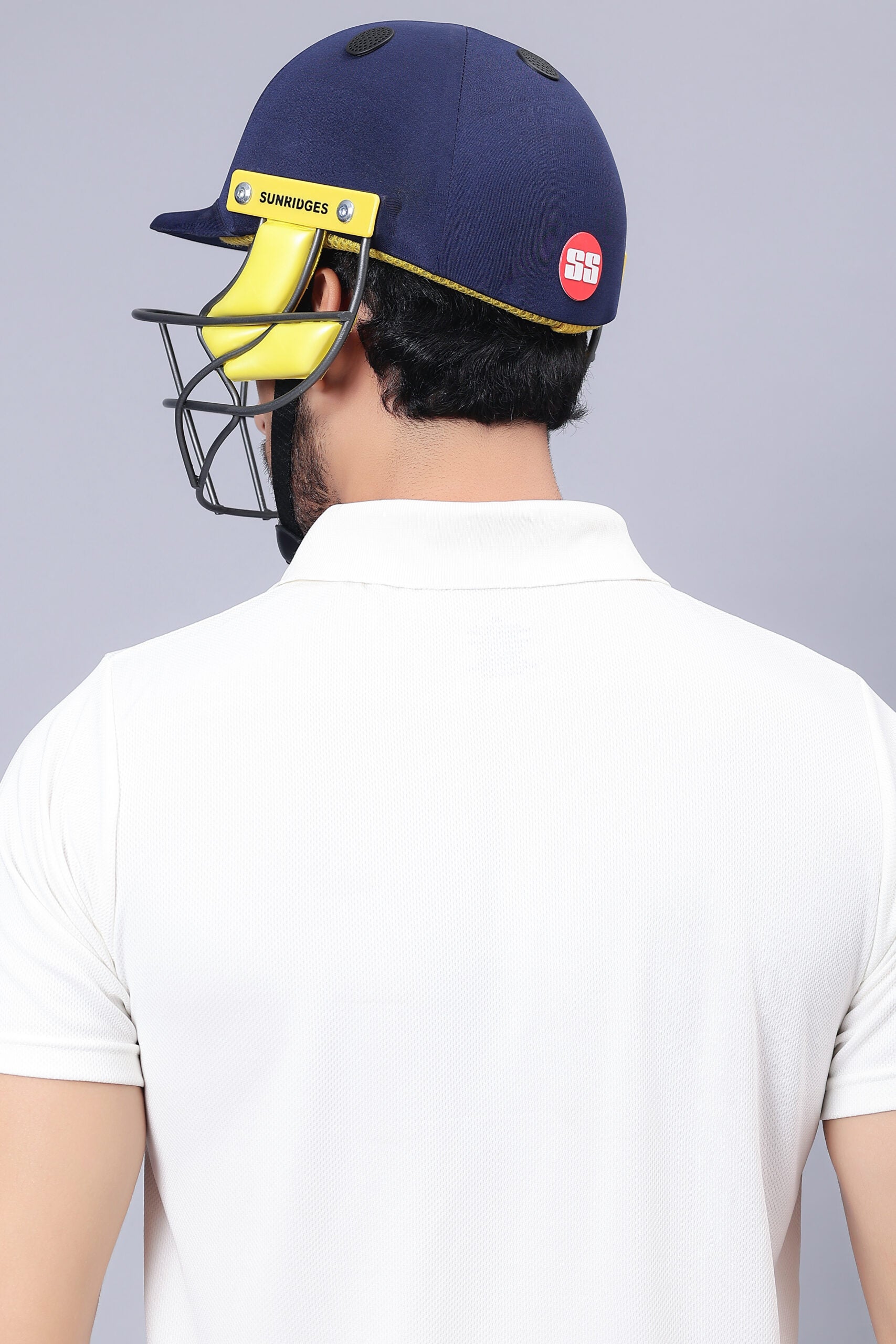 Cric Studio Canada SS Premium helmet with adjustable straps and ventilation, designed for safety and comfort.