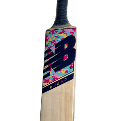 Cricket bat from Cric Studio Canada, NB IND 650 EW model, showing a close-up of the wooden blade and grip.