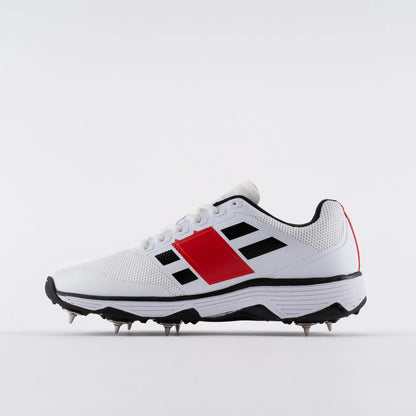 Crick Studio Canada GN8 Players Spike Cricket Shoes showing black shoes with spike studs and supportive instep detail.