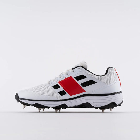 Crick Studio Canada GN8 Players Spike Cricket Shoes showing black shoes with spike studs and supportive instep detail.