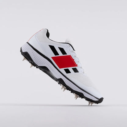 Cricket spike shoes by Cric Studio Canada, GN8 Players Spike Cricket Shoes with side view showing spike tilts and athletic design.