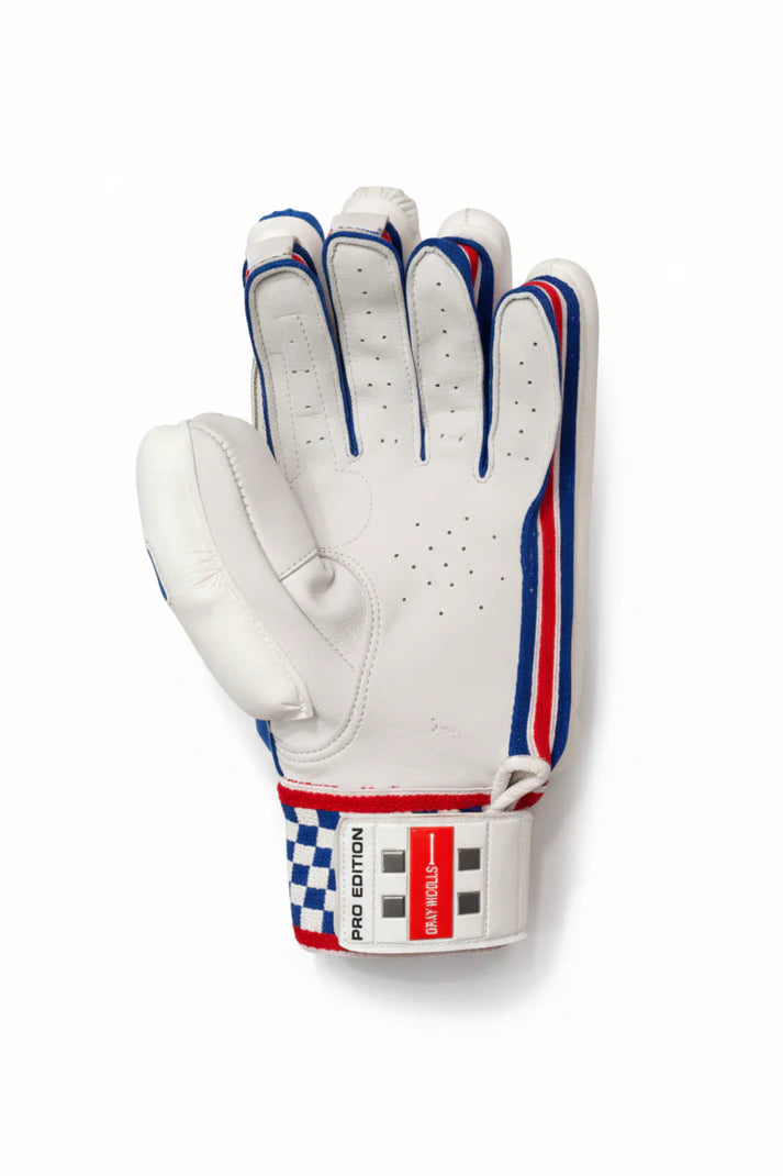 Cric Studio Canada GN PRO Edition batting glove showing the palm side with padded grip and textured leather in black and red.