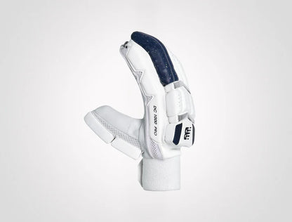 NewBalance DC 10i Pro batting gloves by Cric Studio Canada, showing black and white cricket batting gloves with padding and grip.