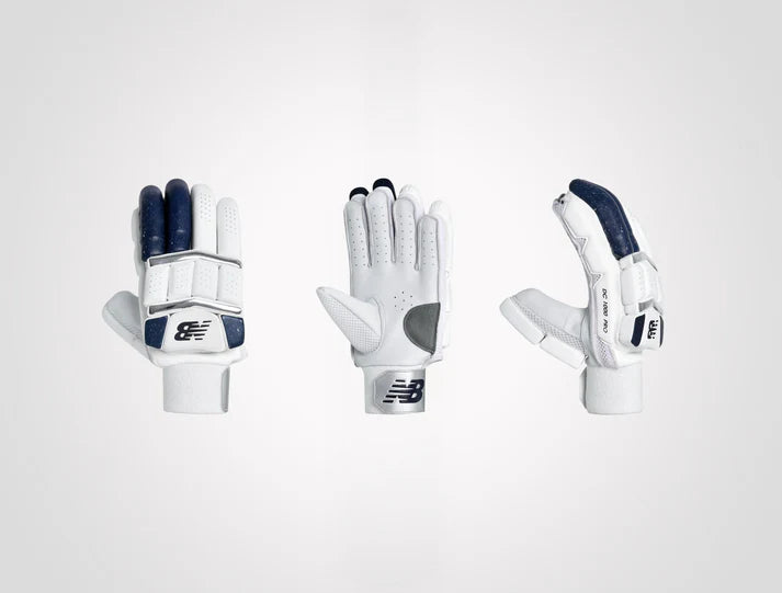 Cric Studio Canada New Balance DC 10i Pro batting gloves with padded palms and adjustable wrist straps for cricket batting.