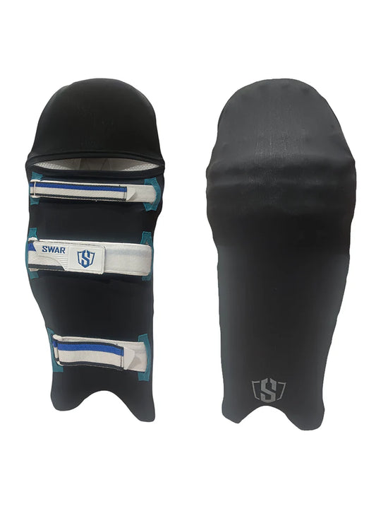 Pair of Cric Studio Canada Swar Leg Pad Covers, protective accessories for cricket leg pads, shown in black with adjustable straps.