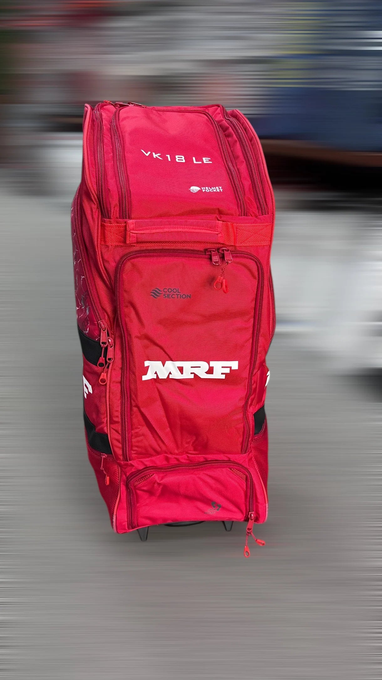 Cric Studio Canada MRF Duffle Wheelie Bag VK 18 LE kitbag with wheels and handle, durable black fabric and spacious interior.