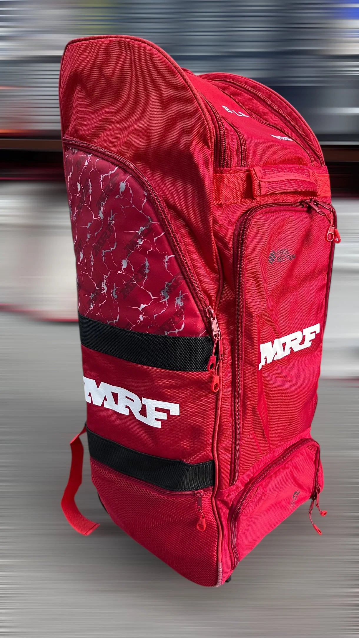 Cric Studio Canada MRF Duffle Wheelie Bag VK 18 LE kitbag in black with handles and wheels, suitable for sports gear and travel.