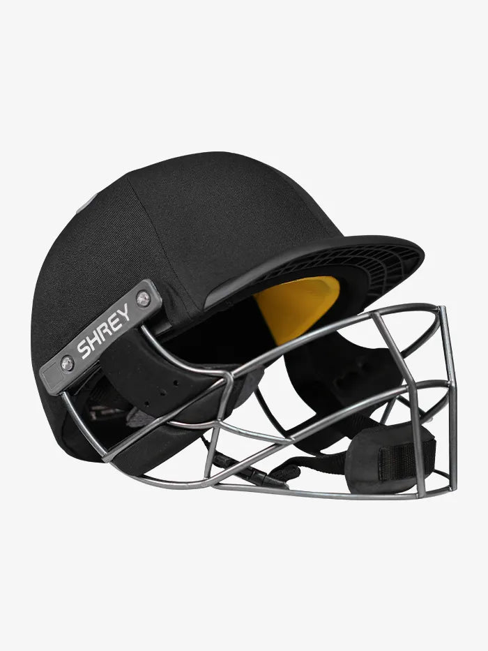 Black Shrey Cricket Helmet Elite Pro by Cric Studio Canada with stainless steel grille and padded interior for protection.