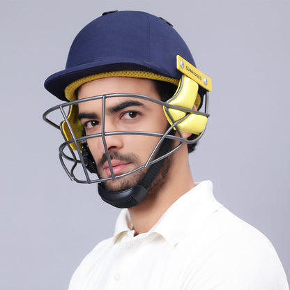 Cric Studio Canada SS Premium helmet showing a sleek black helmet with adjustable strap and ventilation vents.