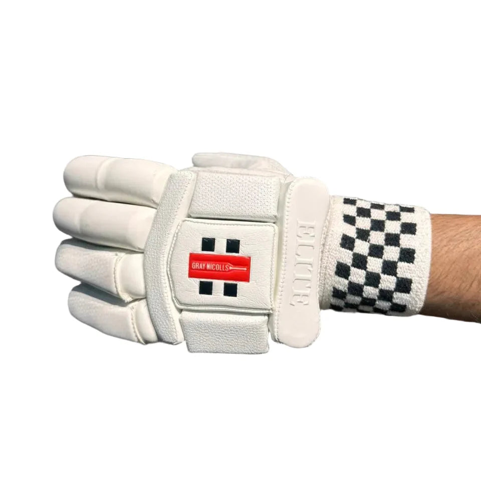 Pair of Cric Studio Canada GN6 Elite batting gloves showing black and red design, padded palms, and adjustable wrist straps.