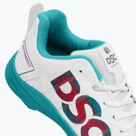 DSC Beamer X cricket shoes with white and blue design, lightweight athletic shoes for cricket players, shown from side view.