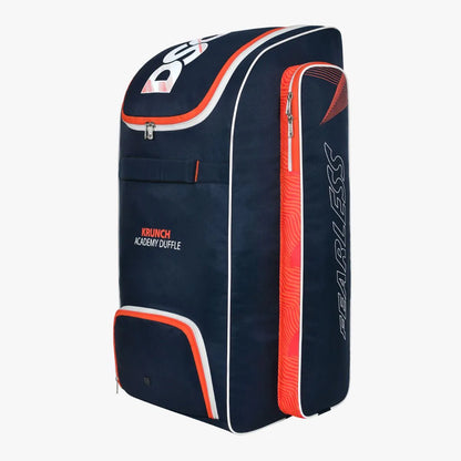 Cric Studio Canada DSC Krunch Academy Duffle Kitbag showing a spacious black sports bag with handles and shoulder strap.