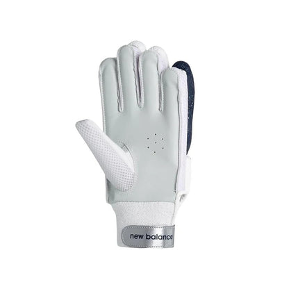 New Balance DC 3i RH batting gloves by Cric Studio Canada, showing the black and white gloves with padded palms and adjustable wrist straps.