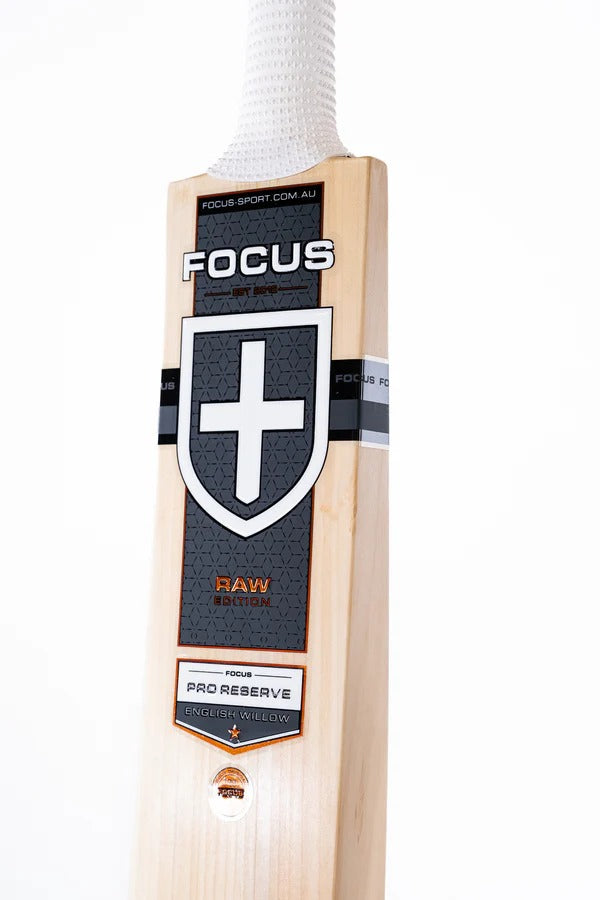 Cricket bat with English willow, Focus Raw Performance cricket bat by Cric Studio Canada, showing the bat's blade and handle.