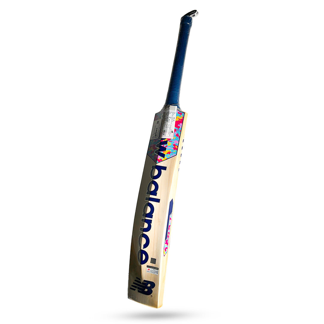 Cricket bat by Cric Studio Canada, NB IND 650 EW model, showing the back of the cricket bat with branding and wood grain details.