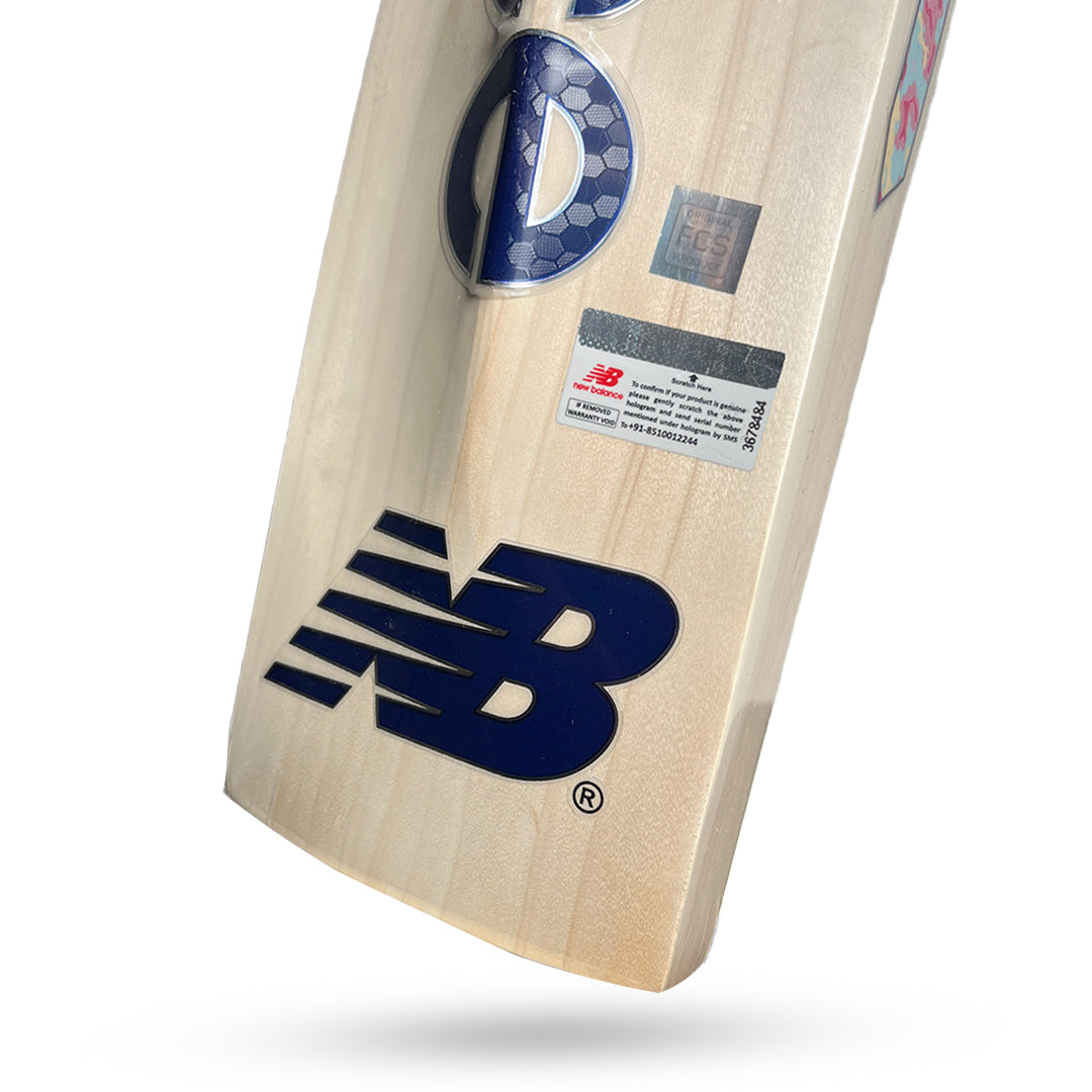 Cricket bat from Cric Studio Canada, NB IND 650 EW model, showing the back side with detailed wood grain and brand logo.