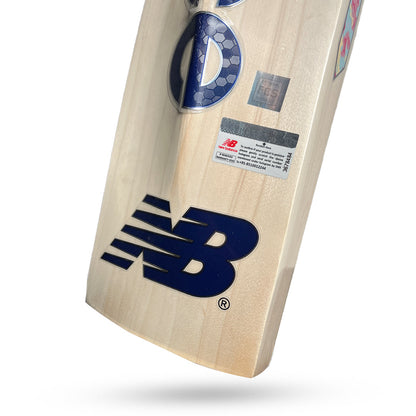 Cricket bat from Cric Studio Canada, NB IND 650 EW model, showing the back side with detailed wood grain and brand logo.