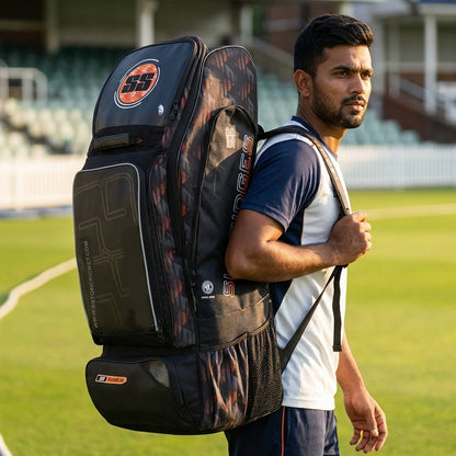 Cric Studio Canada SS Player 2.0 Kit Bag with sturdy handles, multiple compartments, and black and red design for cricket gear storage.