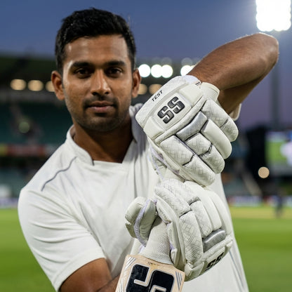 Cricket batting gloves by Cric Studio Canada, Player Grade SS Test model, featuring padded finger protection and breathable fabric.
